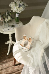 Elegant wedding accessories of the bride in the morning on the day of the celebration.