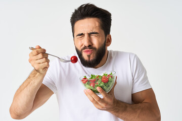 bearded man plate with vegetable salad eating health