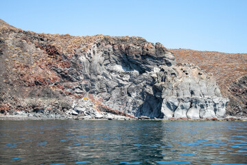 Fototapeta na wymiar photography of a stone island in the sea