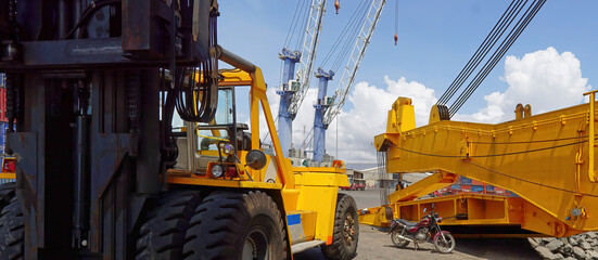 detail of big fork lift and main ramp of big roro vessel in lome harbour - obrazy, fototapety, plakaty