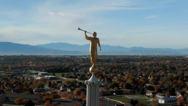 Angel Moroni Statue on LDS Mormon Temple overlooking Beautiful Utah, Aerial