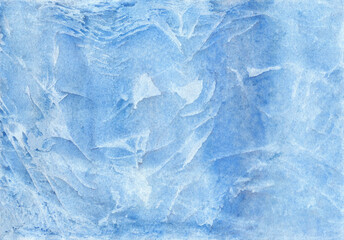 Obraz premium Abstract watercolor hand drawn blue background. Winter frosty effect. Cold color palette.