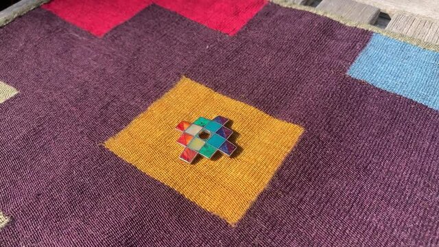 Colorful Chakana At The Center Of A Traditional Peruvian Textile. close up