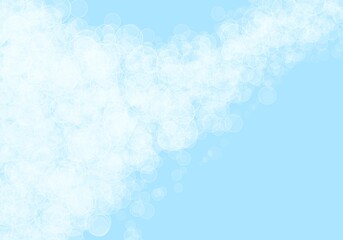 Soap bubbles on light blue background, with copy space