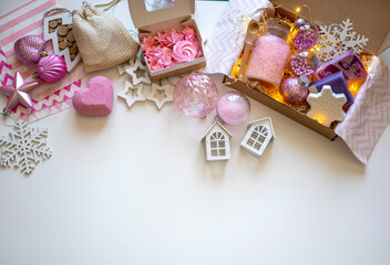 Preparing self care package. Small business, ethical shopping idea. Presents packed in plastic free, craft gift boxes.