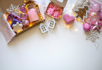 Preparing self care package. Small business, ethical shopping idea. Presents packed in plastic free, craft gift boxes.