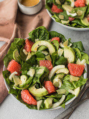 Spinach, fennel, avocado, cheese and grapefruit salad