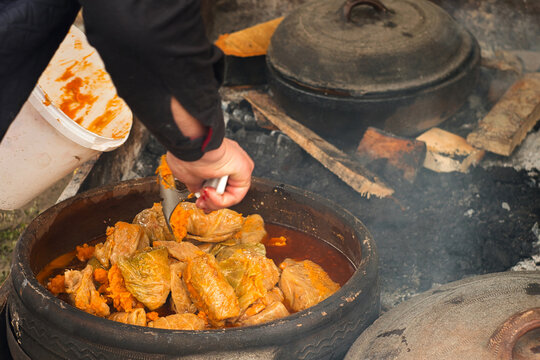 Traditional Balkan winter dish - cabbage rolls filled with minced meat, rice, fried onion and carrot called sarma
