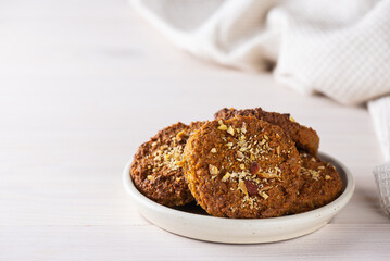 Homemade quinoa cookies on a light background. Sugar, gluten, lactose free, vegan.
