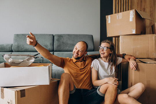 Young family moving into their new house
