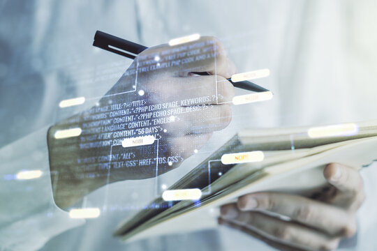 Double exposure of abstract programming language with man hand writing in notebook on background, research and development concept