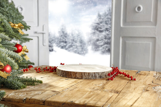Desk of free space and winter window background 