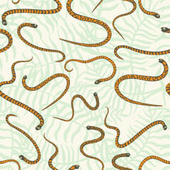 Cute and trendy vector seamless pattern with hand drawn snakes and palm leaves and tropical plants. Botanical and animalistic ornament for printing on fabrics and paper