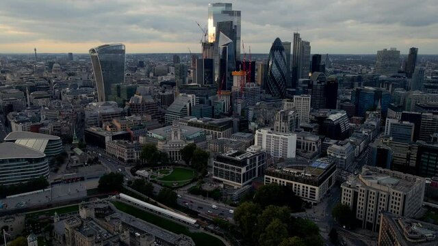 Aerial view of The bank district of central London with famous skyscrapers and other landmarks at sunset. 