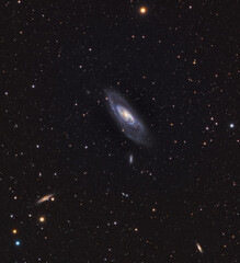 M106, Messier 106 (NGC 4258) is an intermediate spiral galaxy in the constellation Canes Venatici.