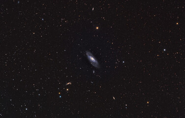 M106, Messier 106 (NGC 4258) is an intermediate spiral galaxy in the constellation Canes Venatici.