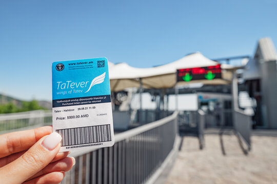 29 May 2021, Halidzor, Armenia: Ticket in hand to the Wings of Tatev cable car. Guinness World Records as the longest non-stop aerial tramway