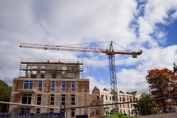 construction site with unfinished building and crane