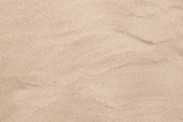 Fototapeta na wymiar Brown background, natural sand texture