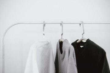 Minimal lifestyle, clothing rack with simple t-shirts