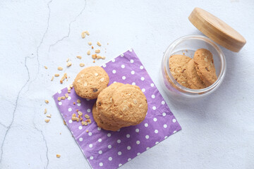 stack of whole meal cookies on wooden background