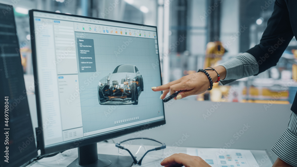 Aufkleber Two Automotive Engineers Discussing Concept Car Blueprints on Desktop Computer in Modern Office at Assembly Plant. Female Industrial Project Manager Talk to Male Designer at Vehicle Factory.