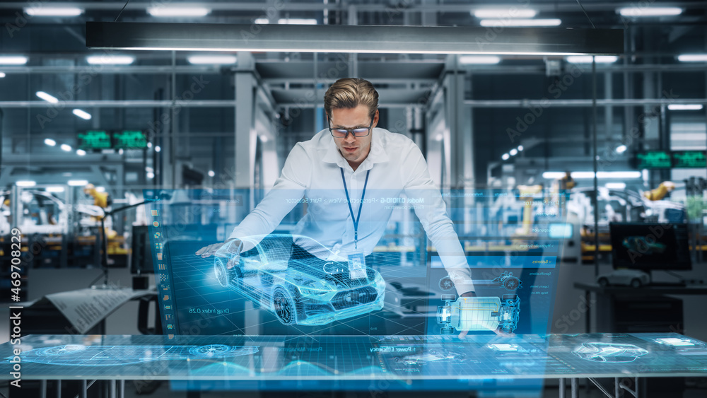 Poster Confident Engineer Working on a New Electric Car with Use of Augmented Reality Hologram in an Office at Car Assembly Plant. Industrial Specialist Working in Technological Vehicle Development Facility.