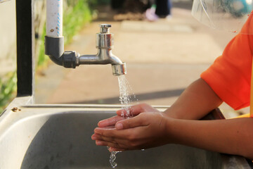 wash your hands in the outdoor sink.