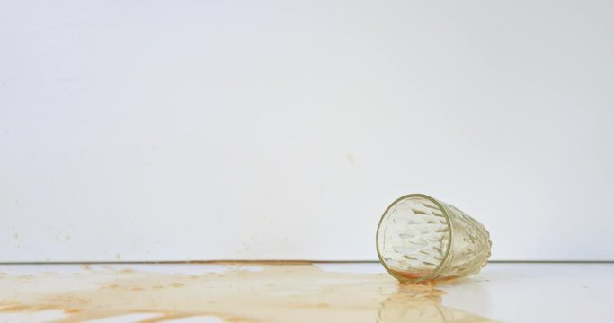 Slow motion shot of coffee spilling