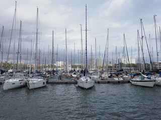 Fototapeta na wymiar Scenic luxury yachts in port at city of Barcelona in Spain
