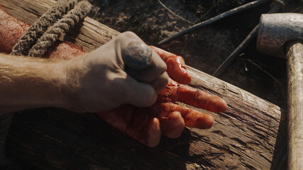 Crop executioner crucifying Jesus Christ