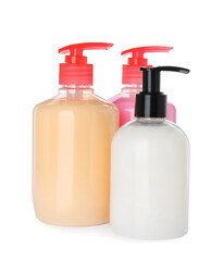 Dispensers of liquid soap on white background