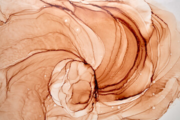 Abstract ocher ink watercolor background. Yellow orange brown paint stains and spots in water,...