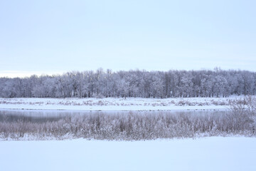 Beautiful Red River View. Frost Snow Day. Peaceful Concept.