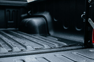 Close-up of an open trunk of a car with a reliable coating