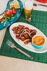 Delicious Homemade Classic Food Brazilian Dish Plate Menu Lunch Breakfast Rice Beans Pasta Sausage Shrimp on the Table