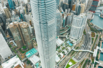 Fototapeta na wymiar Aerial shot a IFC tower - At 420m high and 88 storeys is a dominant building of Hong Kong's skyline.