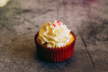 Delicious cupcakes. Cupcakes on a concrete table