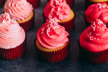 Delicious cupcakes. Cupcakes on a concrete table