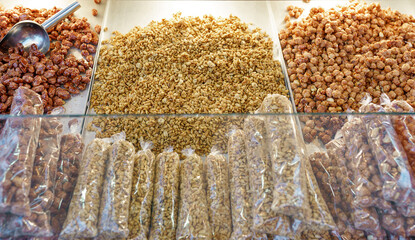 Caramelized nuts. Typical food at festivals and holiday markets.