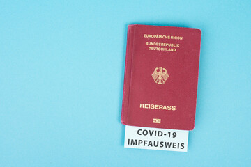 German passport with covid-19 certificate, traveling due to pandemic, new normal