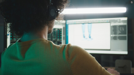 Man working with 3D modeling software