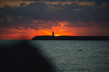 Sunrise with lighthouse view in Spain