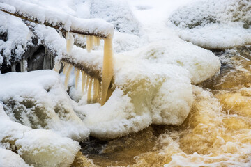 Icicle hanging at a icy cold creek