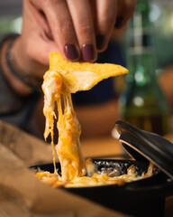 person eating nachos