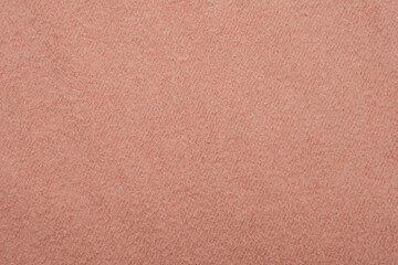 Texture of soft pink fleecy fabric.