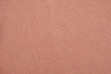 Texture of soft pink fleecy fabric.