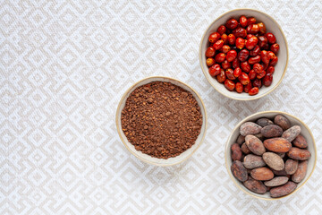 Spice blend made of raw cocoa and dried chili pepper. Spicy cacao condiment top view.