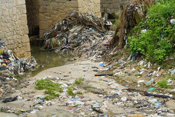 Rubbish piled up in the stream in Educandos, district of Manaus. Amazon Brazil. Photographed on November 17th, 2021 