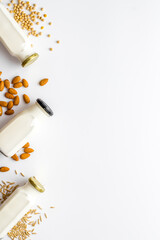 Non dairy vegan milk with nuts and cereals. Diet nutrition concept